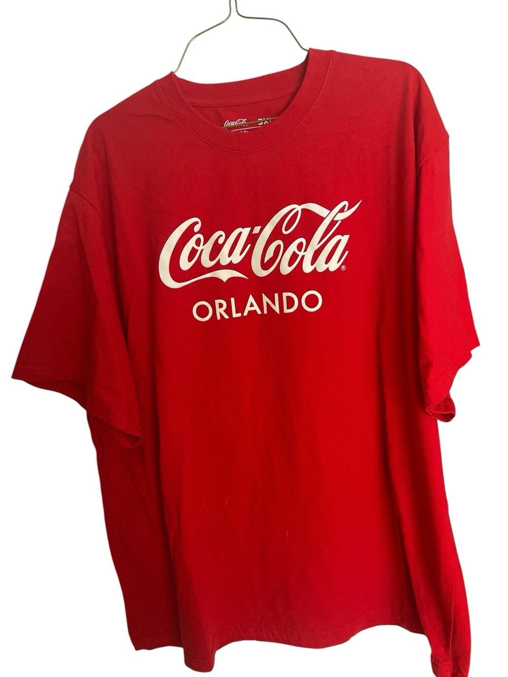 COCA COLA SIZE 3XL RED TEE WITH COCA COLA ORANDO ON FRONT WITH WHITE LETTER